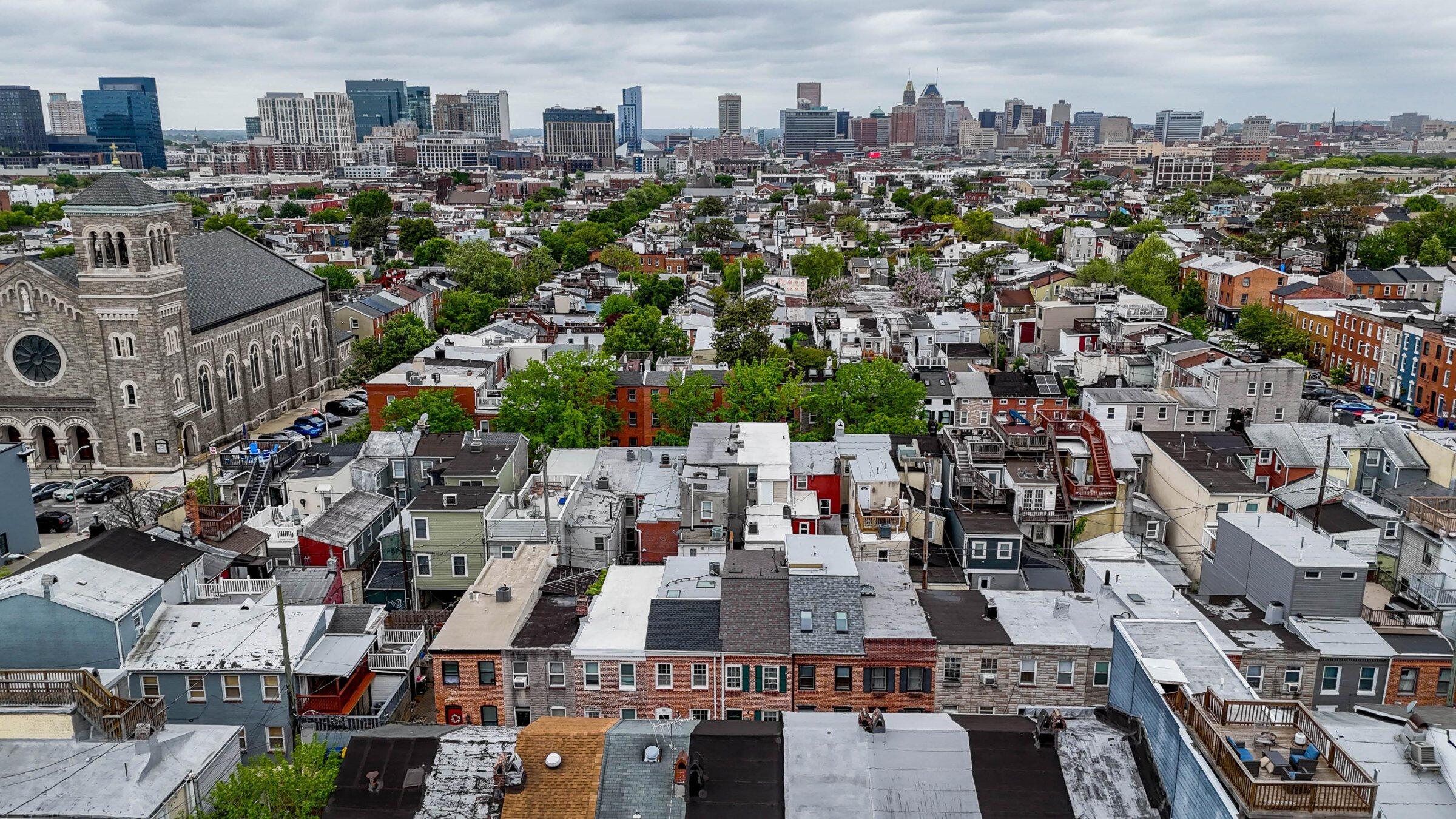 Aerial drone view of a Baltimore neighborhood by Teranga Vision